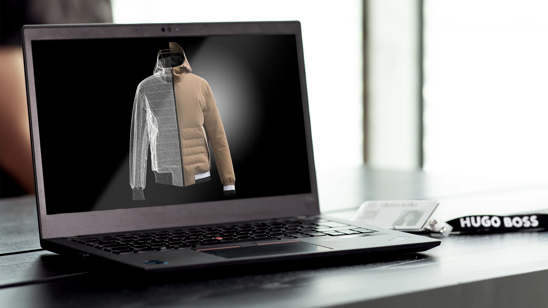 Laptop with a split jacket: 50% mock-up design & 50% final product (Photo)